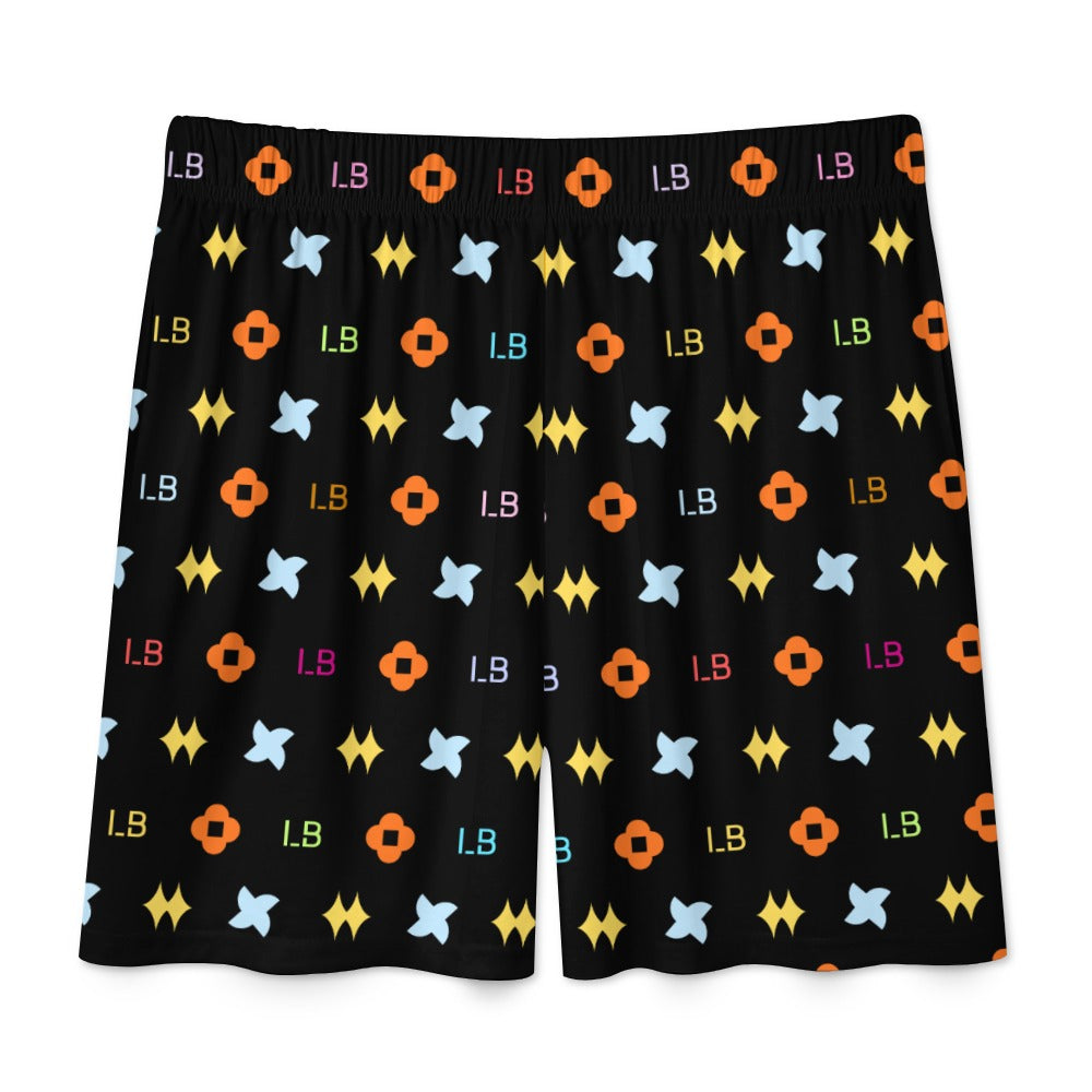 Black shorts with colorful patterns: blue stars, orange shapes, yellow diamonds, and "L8" text.