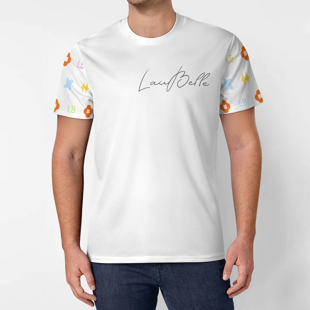 Man in white t-shirt with cursive logo and colorful patterned sleeves on plain background.