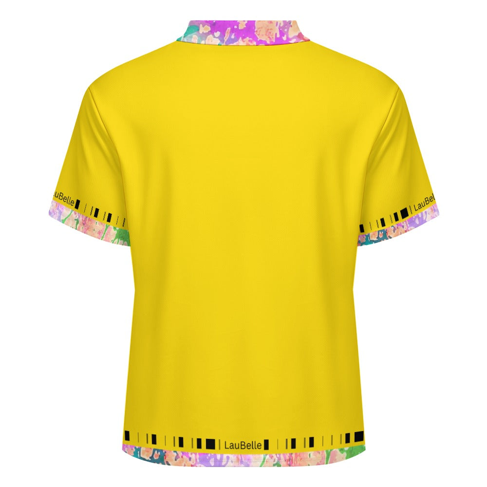 Bright yellow shirt with multicolored abstract trim on the collar and sleeves.