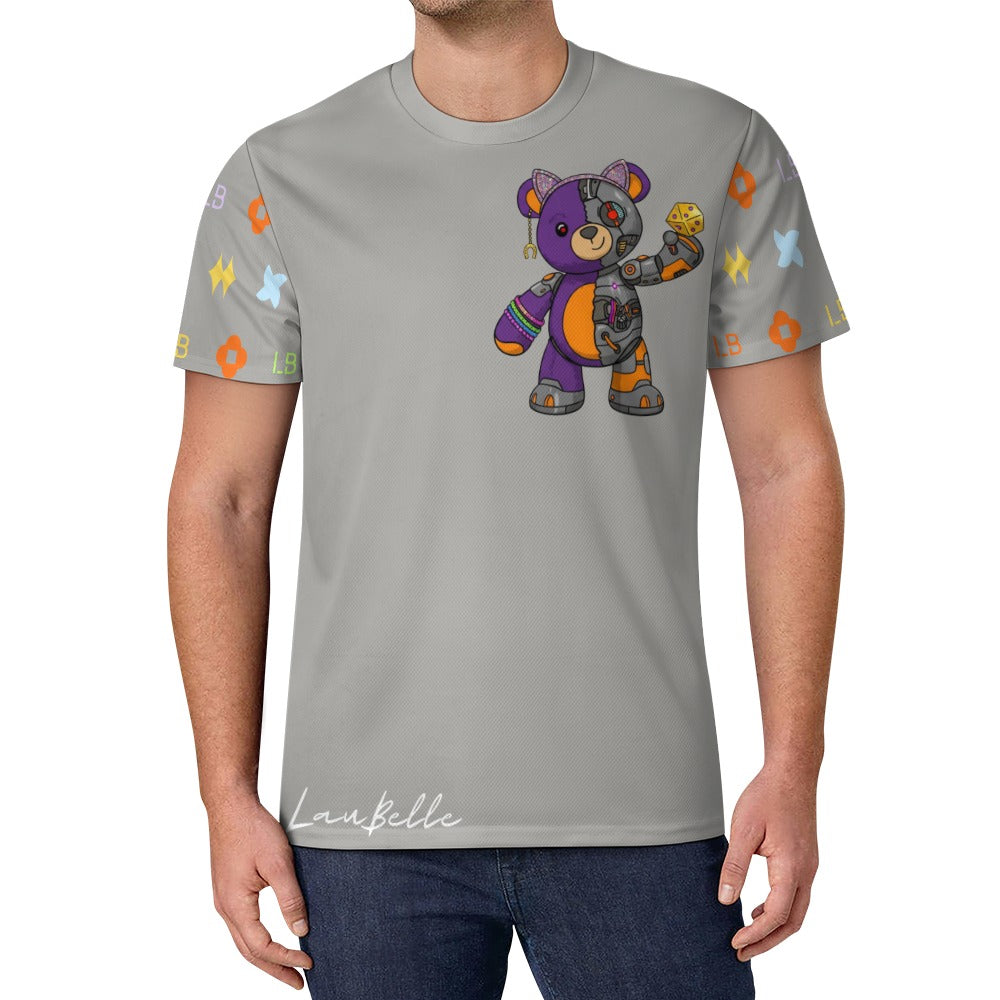Man in light gray T-shirt with colorful patchwork bear graphic and patterned short sleeves.