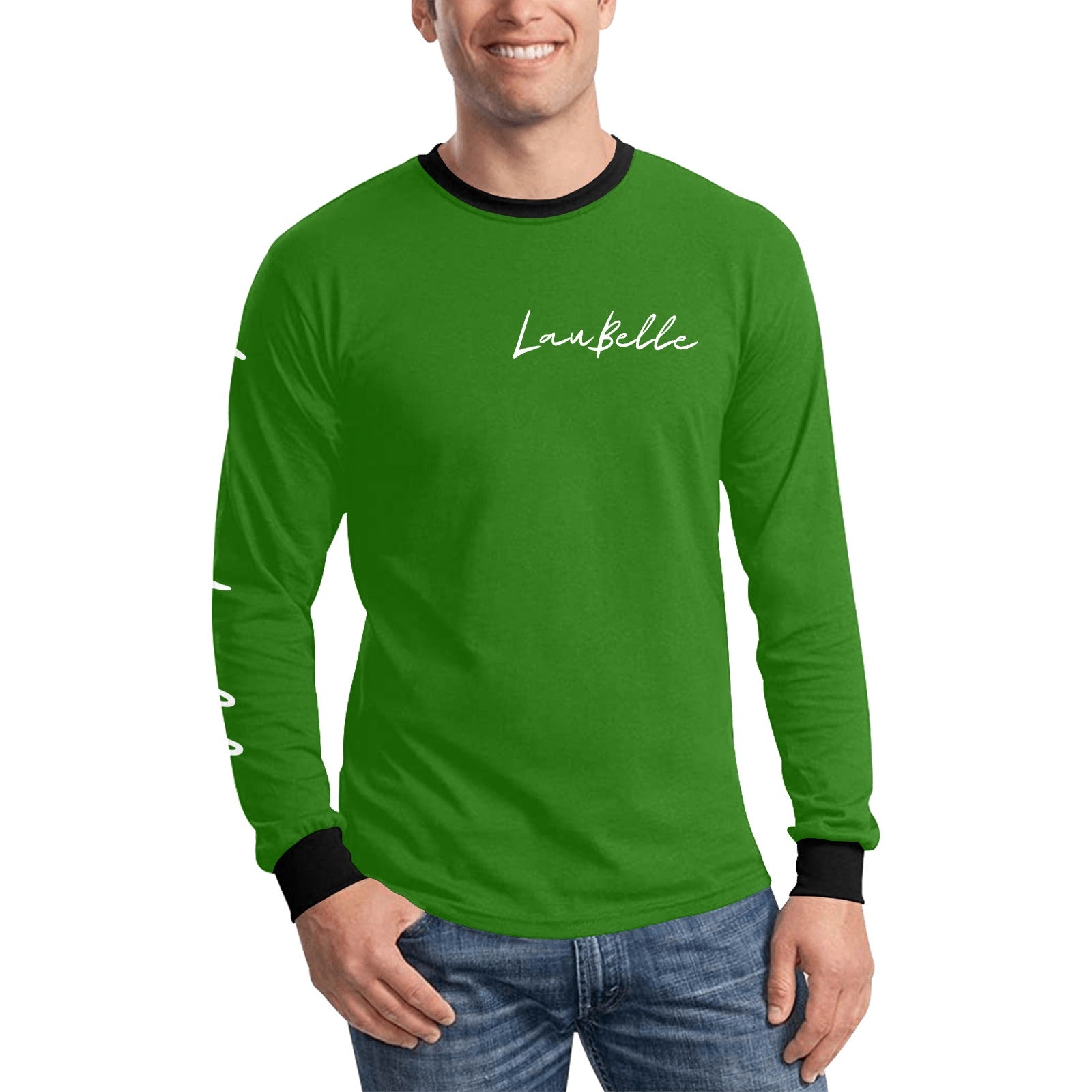 Man in green long-sleeve shirt with black trim and text, wearing blue jeans, smiling.