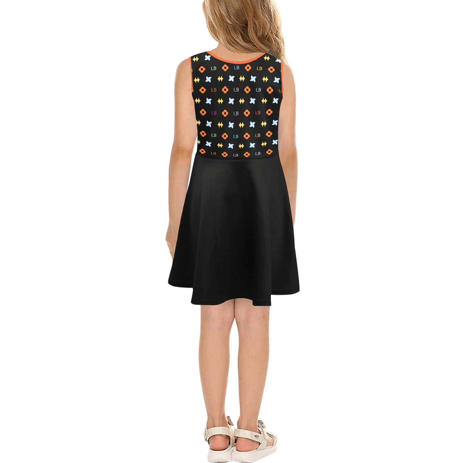 Girl in a sleeveless black dress with colorful star pattern on top, standing with back turned.