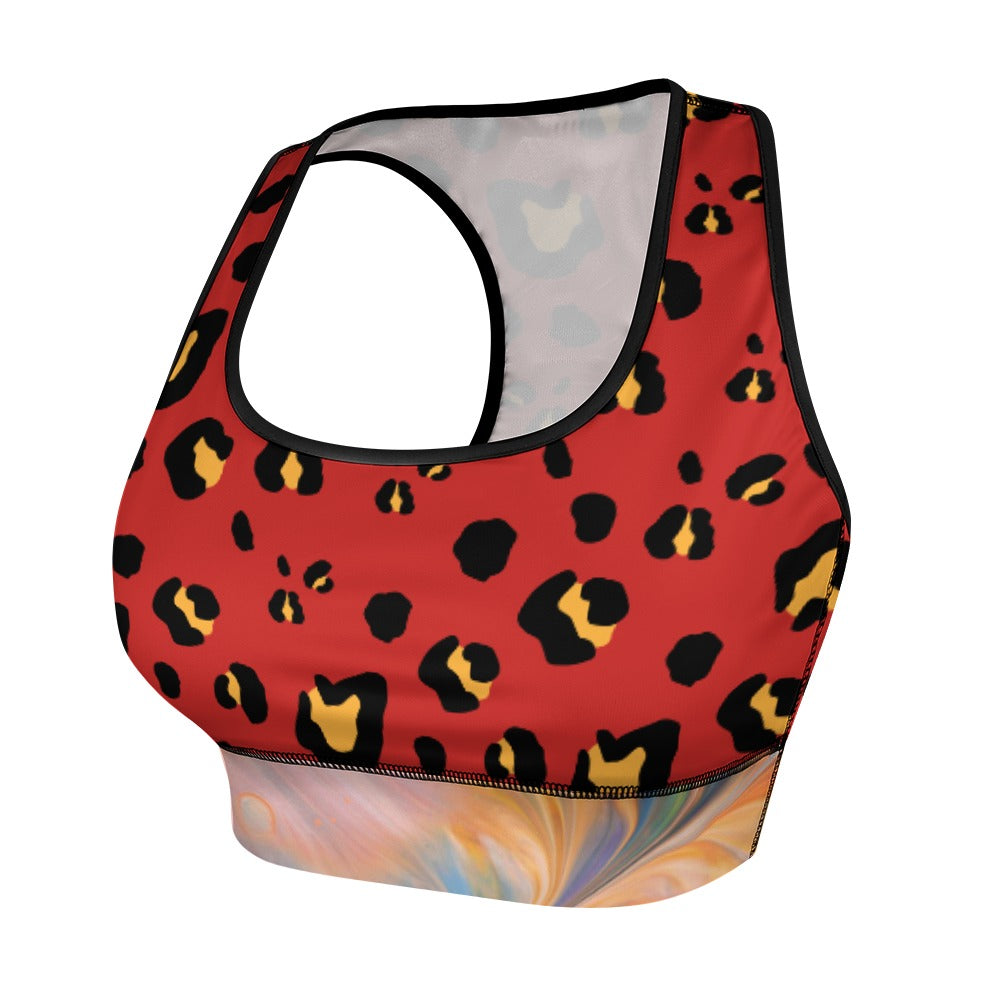 Red sports bra with black and yellow leopard spots, black trim, and a colorful swirl pattern below.