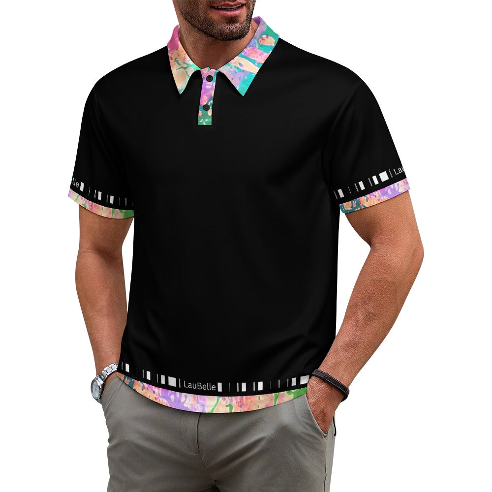 Man wearing a black polo shirt with colorful collar and cuffs, and gray pants.