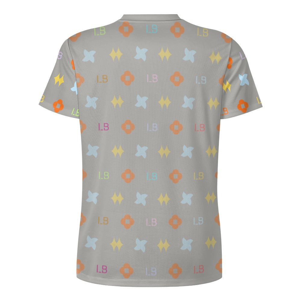 Gray t-shirt back with pastel geometric shapes and small “L8” text in a repeating pattern.