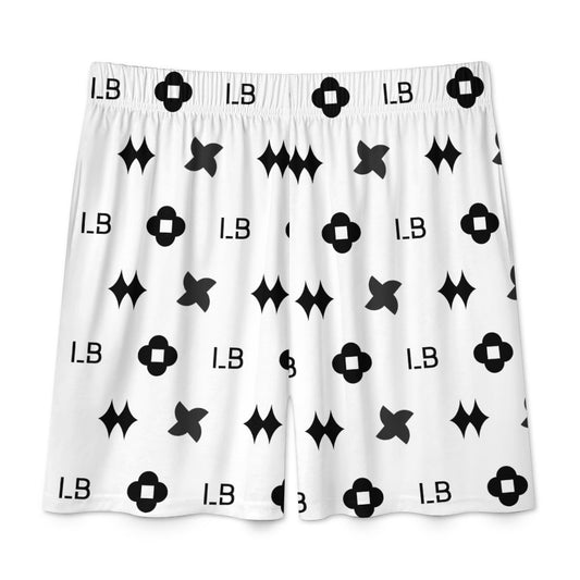 White boxers with black geometric patterns, including crosses, stars, and "I.B" lettering.