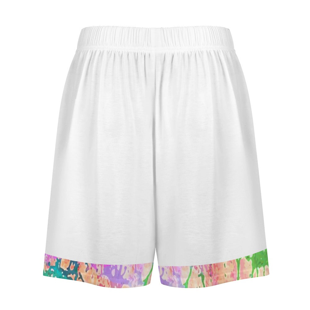 White shorts with colorful abstract patterns on the hem, including pink, purple, and green.