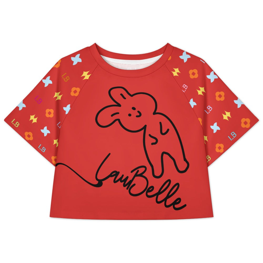 Red shirt with a black outlined bunny, "La Belle" text, and colorful patterns on the sleeves.