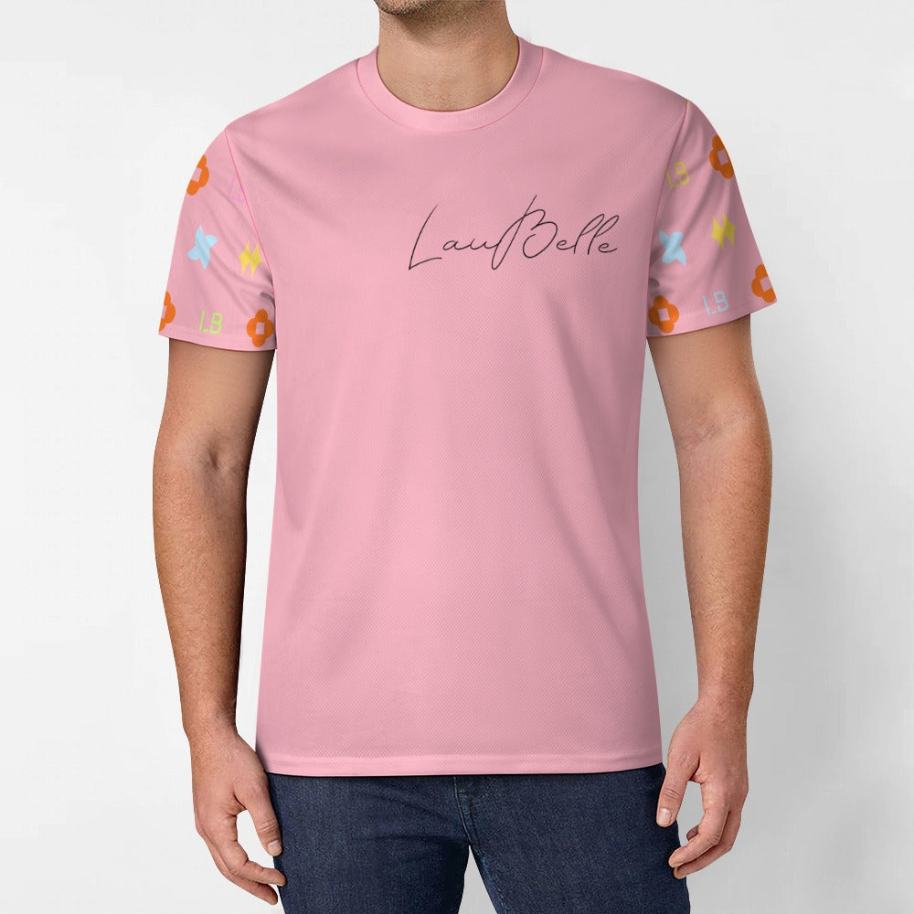 Man wearing pink t-shirt with script logo and colorful floral sleeves on white background.