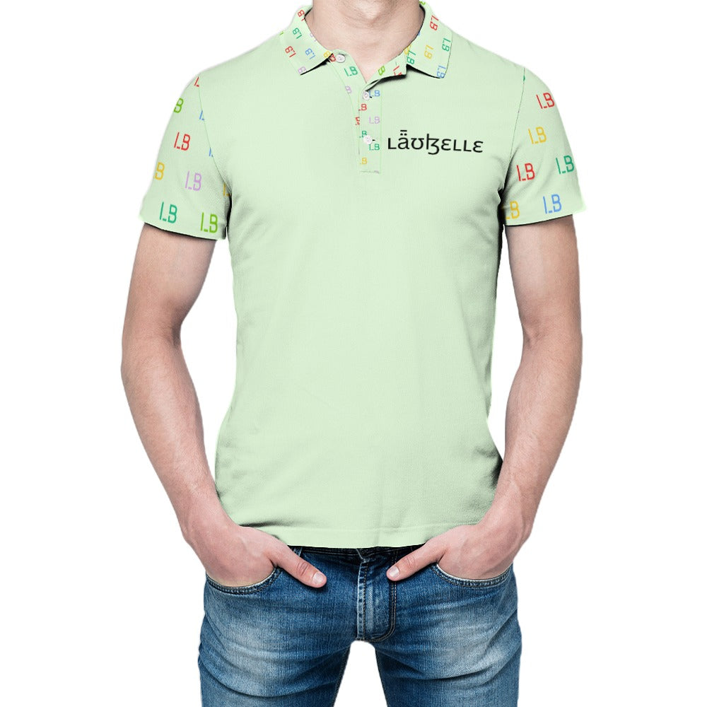 Man in light green polo shirt with colorful text on sleeves, blue jeans, and hands in pockets.