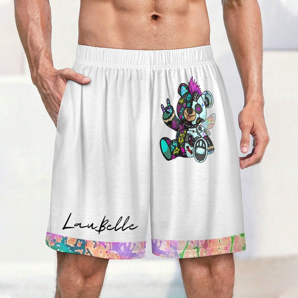 White shorts with a colorful teddy bear design and a multicolored paint-splatter hem.