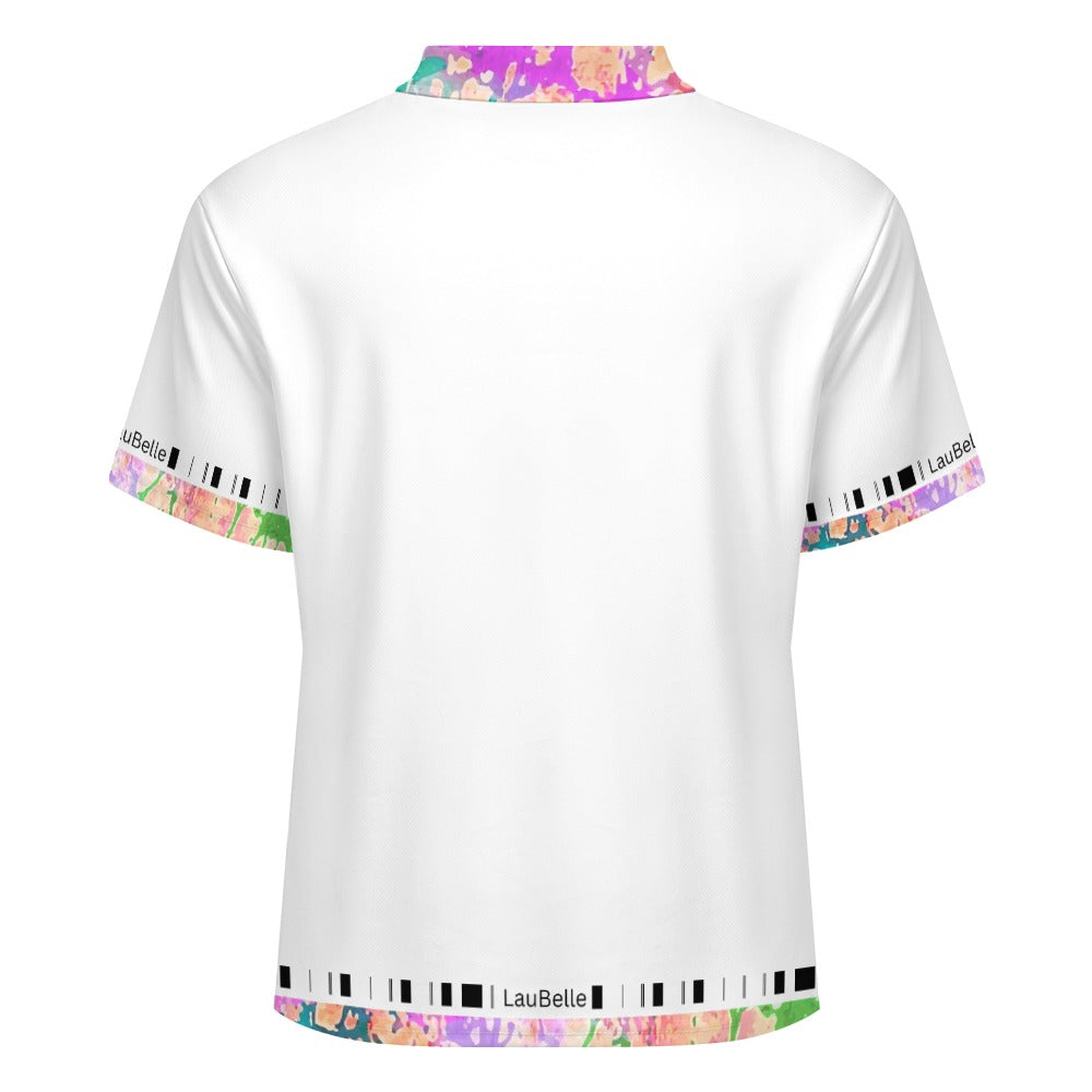 White t-shirt with colorful abstract patterns on the collar and cuffs, featuring a black stripe.