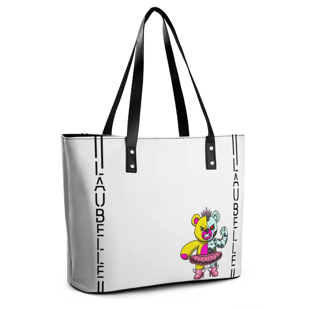 White tote bag with black straps, colorful bear design, and "LA BELLE" text on the sides.
