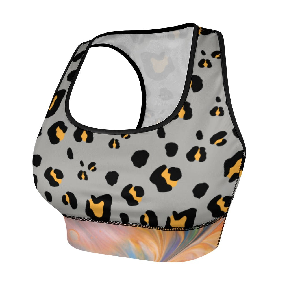 Leopard print sports bra with orange and black spots on gray, featuring a multicolor abstract band.