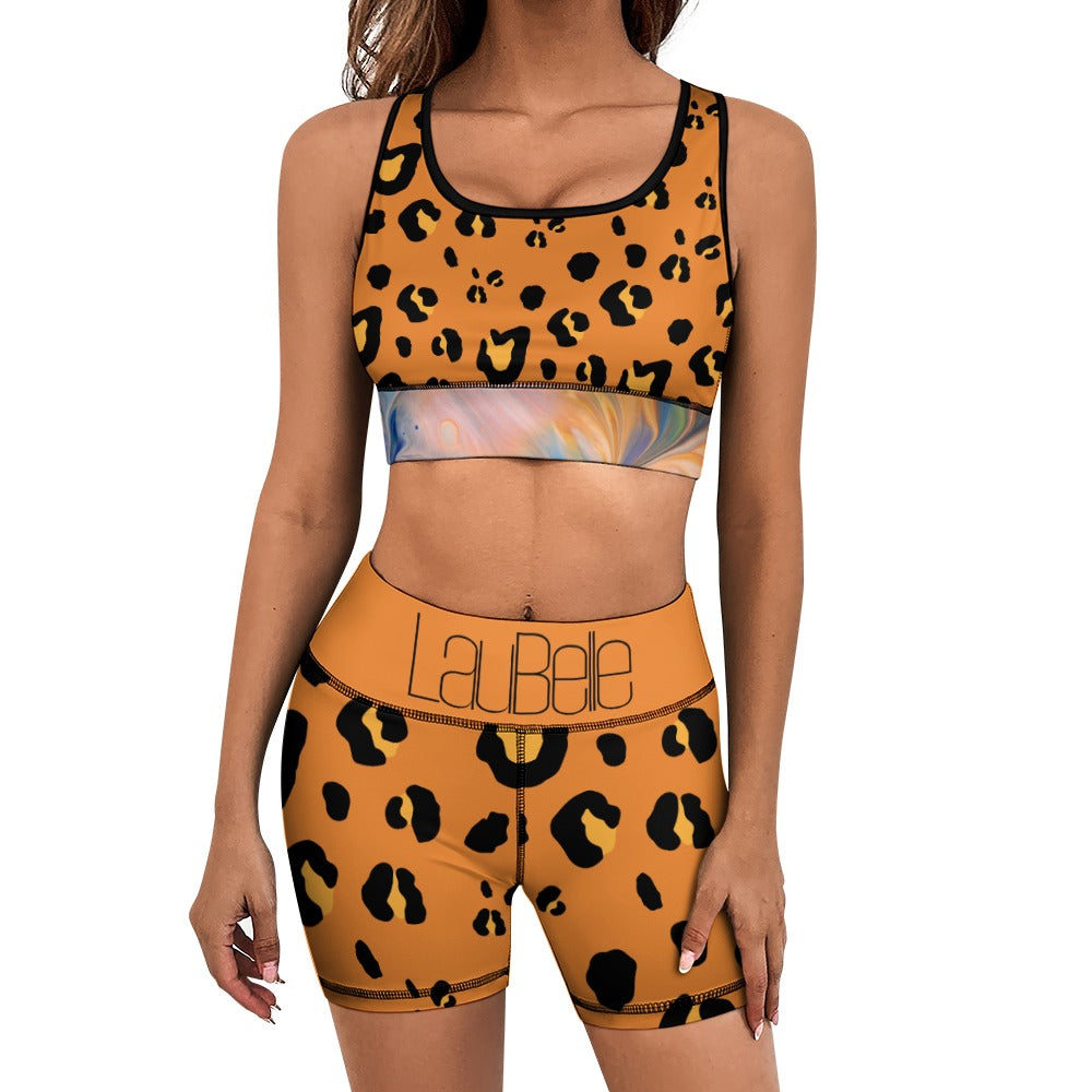 Woman in leopard print sportswear with a colorful, abstract waistband design.