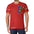 Man in red T-shirt with colorful patchwork teddy bear graphic and patterned sleeves.