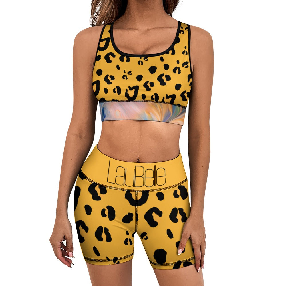 Woman in yellow leopard-print sportswear with black accents and "LaBebe" on waistband.