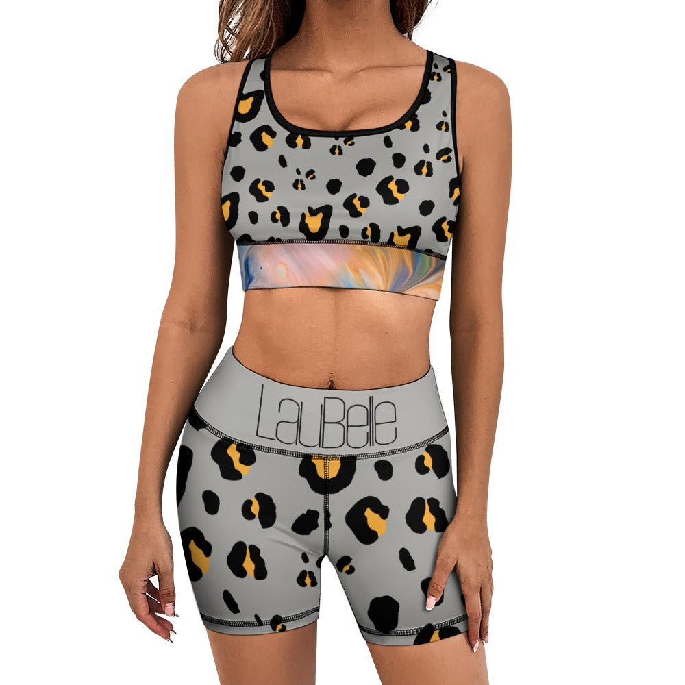 Woman in leopard print workout set with gray waistband, colorful band, and "La Bebe" text.