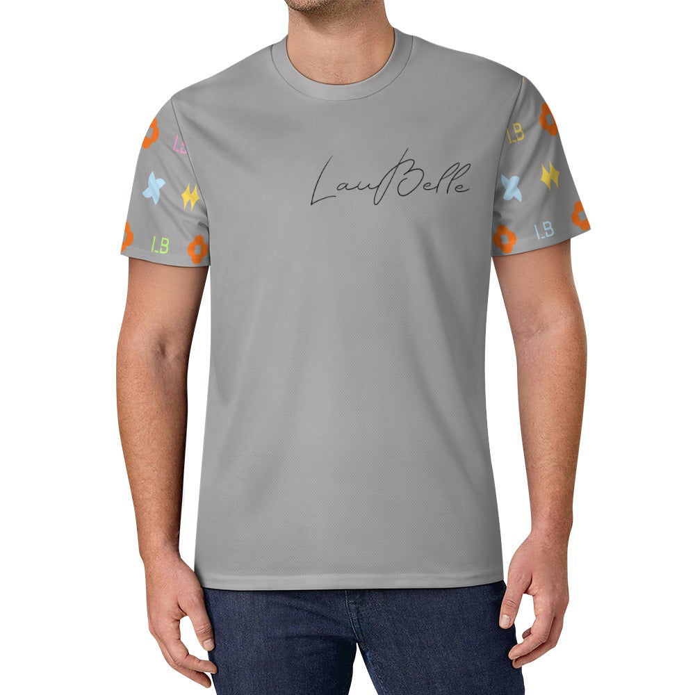Man wearing gray T-shirt with cursive chest logo and colorful geometric icons on sleeves