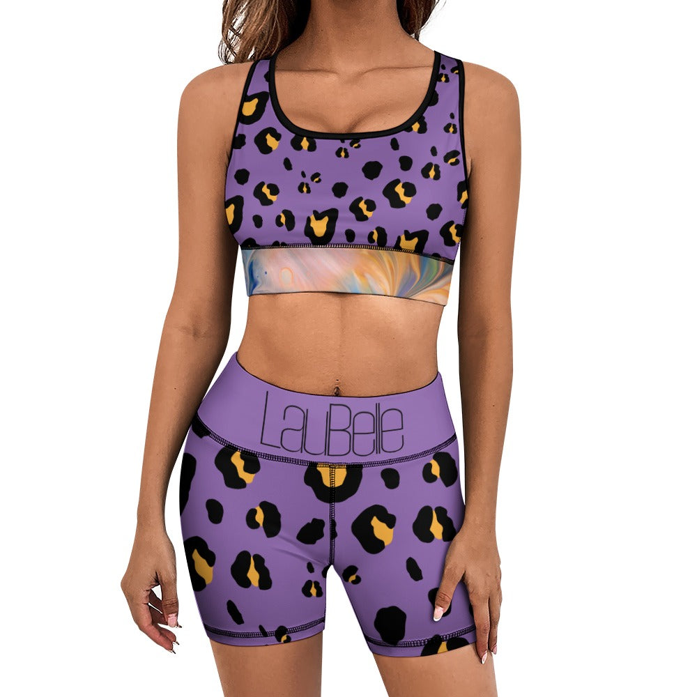 Woman in a purple leopard print sports outfit with "LaBela" on the waistband.