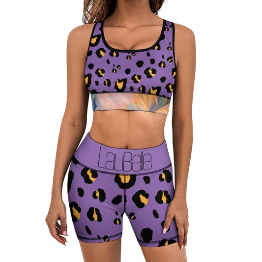 Woman in a purple leopard print sports outfit with "LaBela" on the waistband.