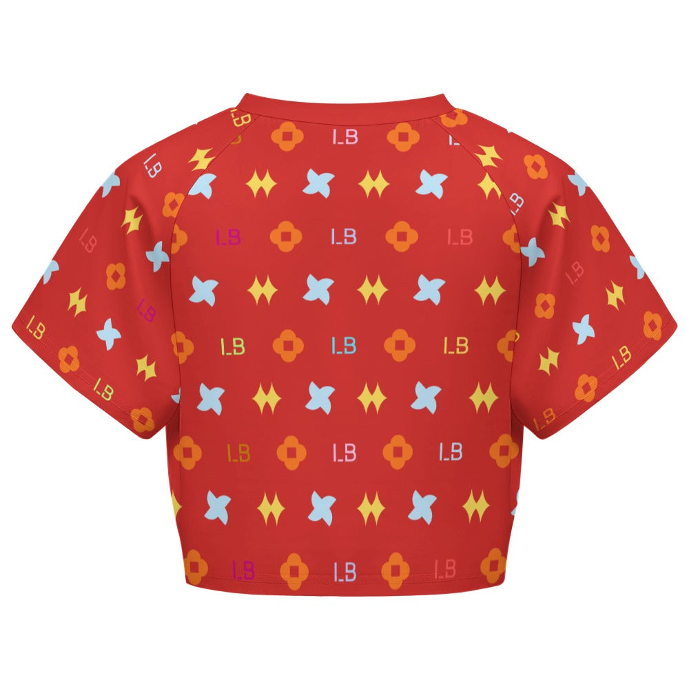 Red shirt with multicolored geometric patterns and letters "LB" in various places.