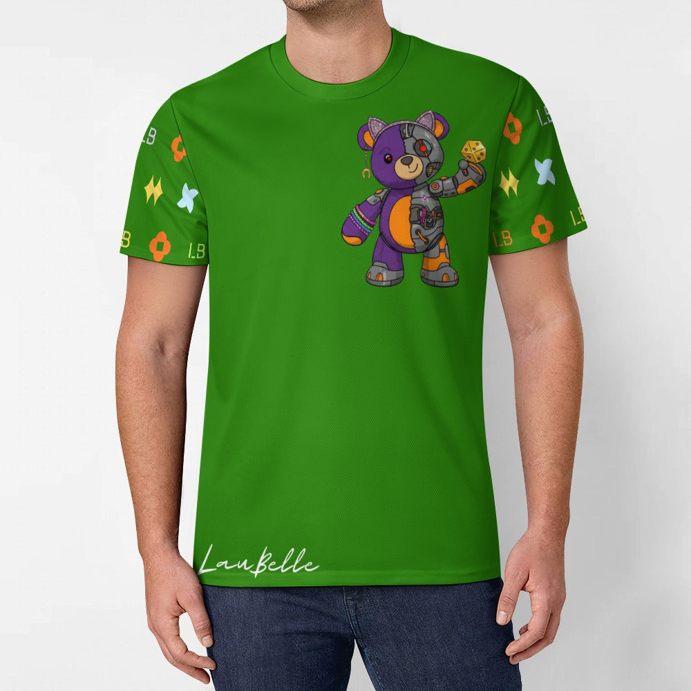 Man wearing green T-shirt with colorful patchwork teddy bear and bright geometric sleeve icons.