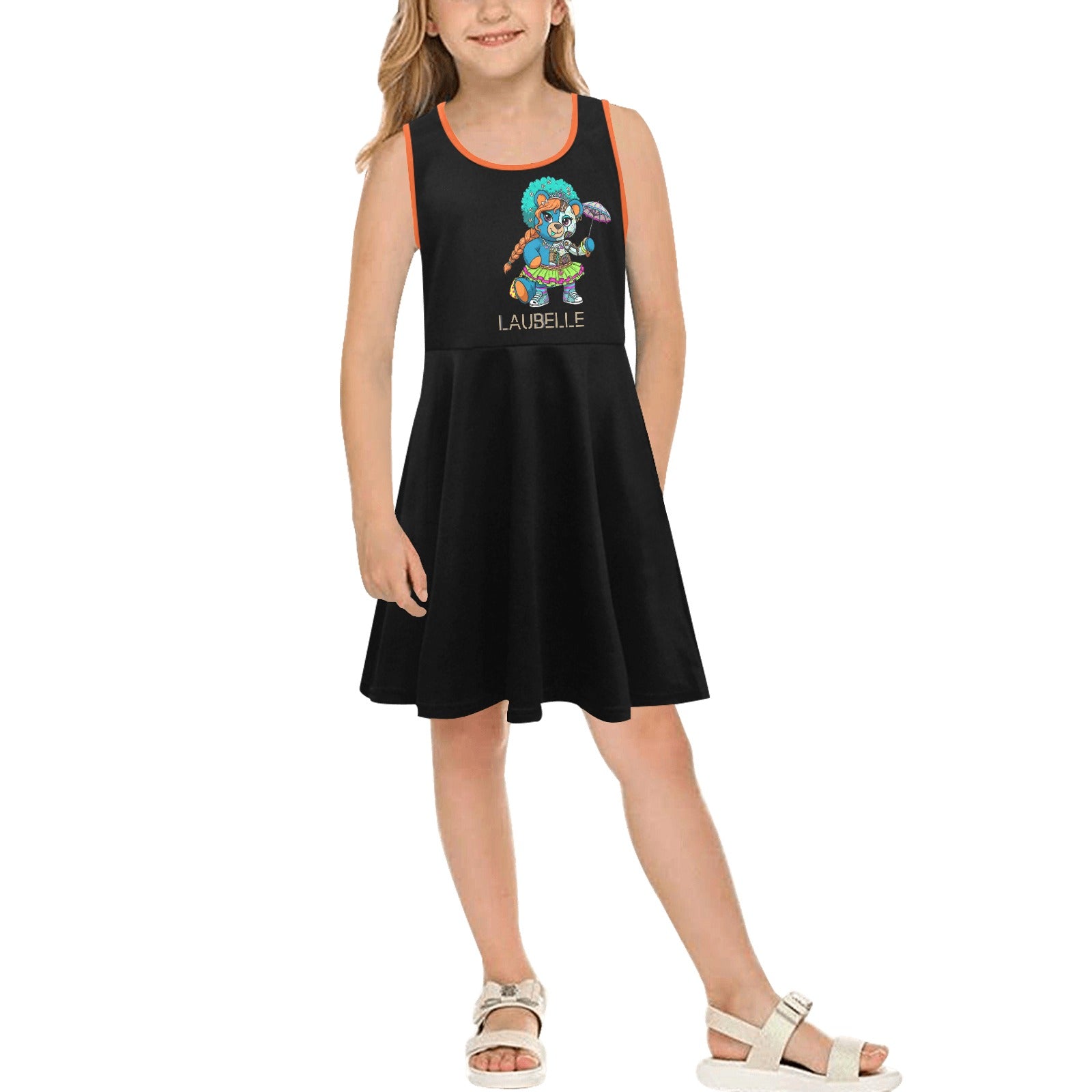 Young girl in a black dress with a colorful cartoon character and "LABELLE" text, wearing sandals.